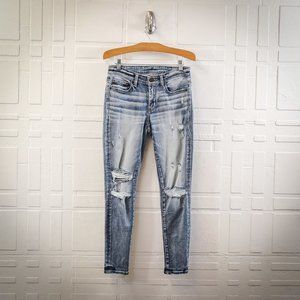 BKE Bella Distressed Skinny Jean. Waist Measures Approx. 28"